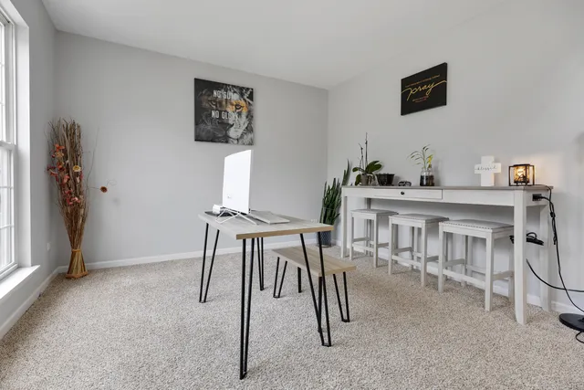 a view of a livingroom with furniture and a furniture