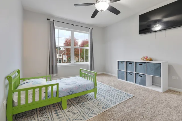 a bathroom with a granite countertop toilet a sink and a bathtub