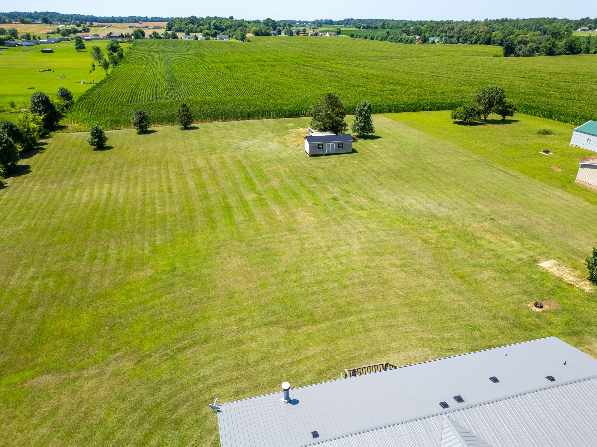 579 Cook Road Portland, TN 37148 - Photo 27 of 34 a view of a lake with a big yard