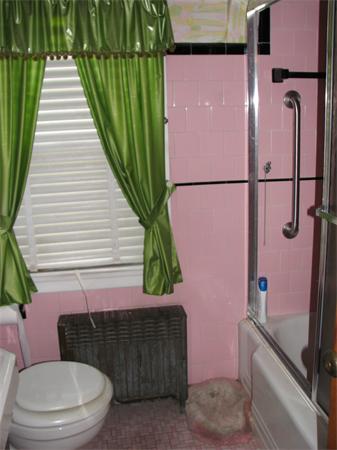 68 Montgomery Street Springfield, MA 01151 - Photo 9 of 15 a bathroom with a toilet and a shower