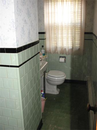 68 Montgomery Street Springfield, MA 01151 - Photo 10 of 15 a bathroom with a toilet and a shower