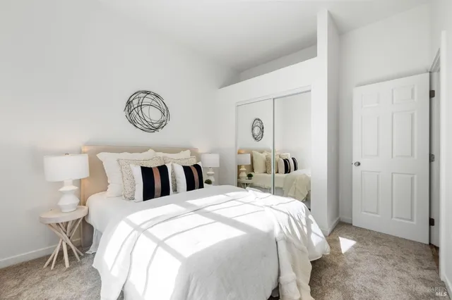 a room with a sink and a stove top oven