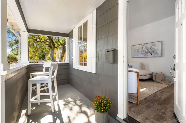 a workspace with furniture and a window