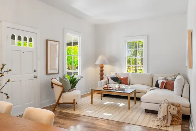 a view of a dining room with furniture window and outside view