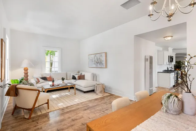 a kitchen with stainless steel appliances a sink stove and cabinets