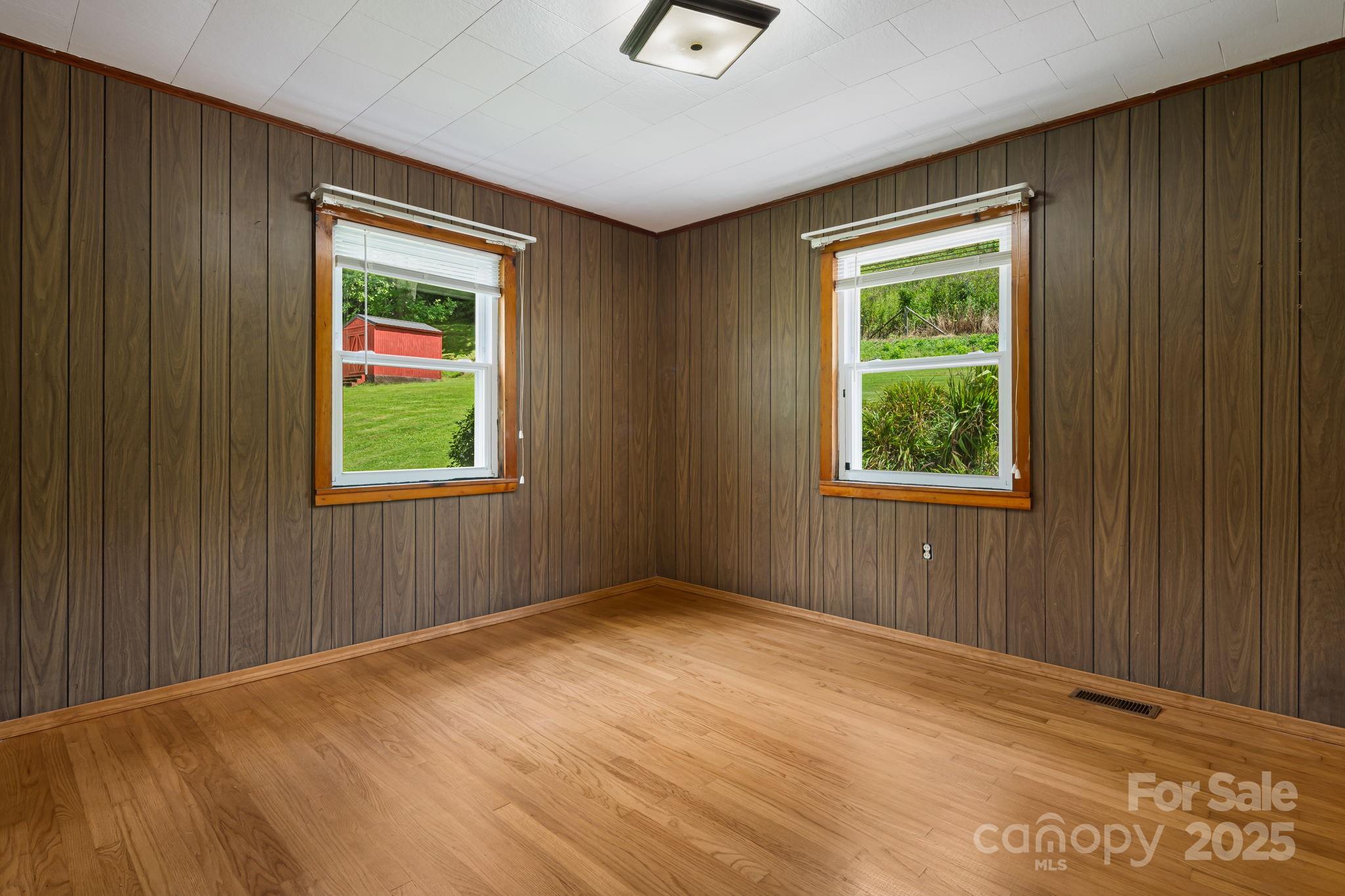 474 Smith Creek Road Mars Hill, NC 28754 - Photo 20 of 27 an empty room with a window