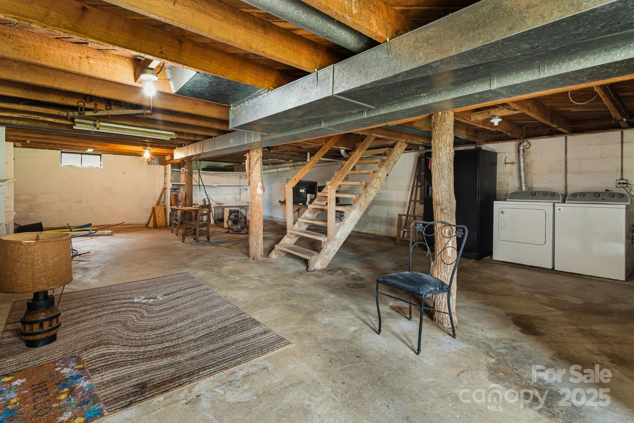 474 Smith Creek Road Mars Hill, NC 28754 - Photo 24 of 27 a view of a room with gym equipment