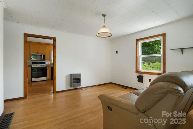 a living room with furniture and a window