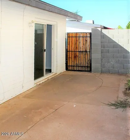 a view of an empty room with windows