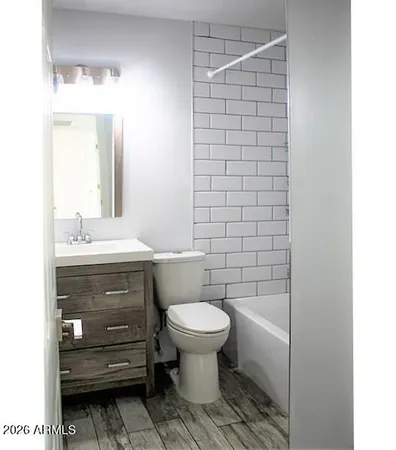 a bathroom with a sink and a toilet