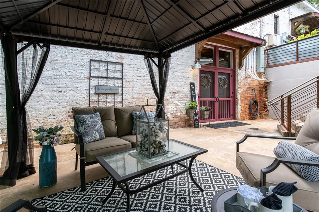 a outdoor living space with furniture