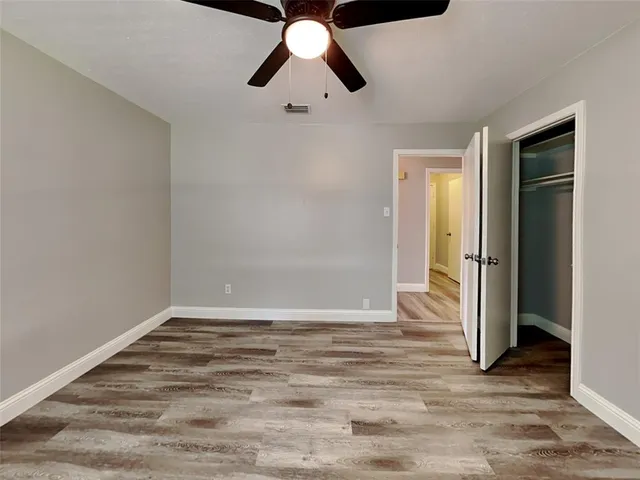 a view of an empty room and window