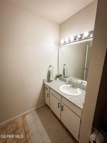 a view of balcony with a potted plant
