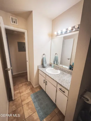 a bathroom with a sink a toilet and view