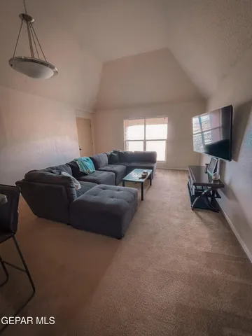 a view of swimming pool from a balcony