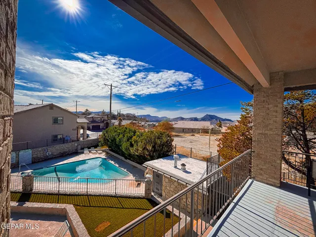a view of a balcony with an outdoor space