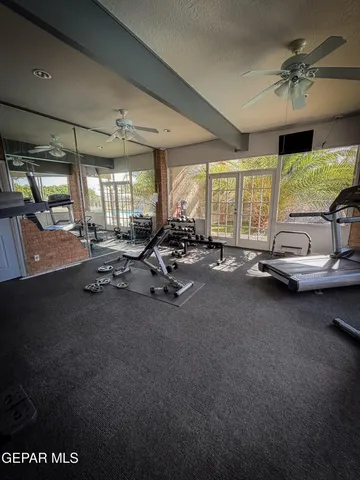 a view of a room with gym equipment