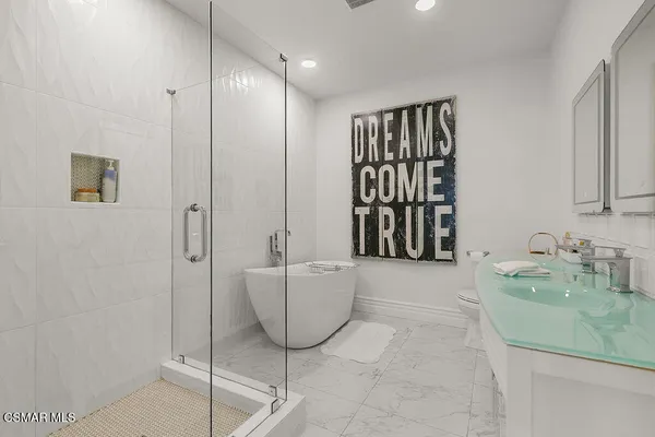 a workspace with furniture and a potted plant