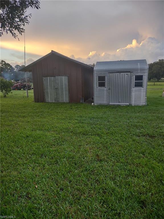 2260 Howard Road LaBelle, FL 33935 - Photo 6 of 24 Brown Shed 16'x12'Metal Shed 8'x12'