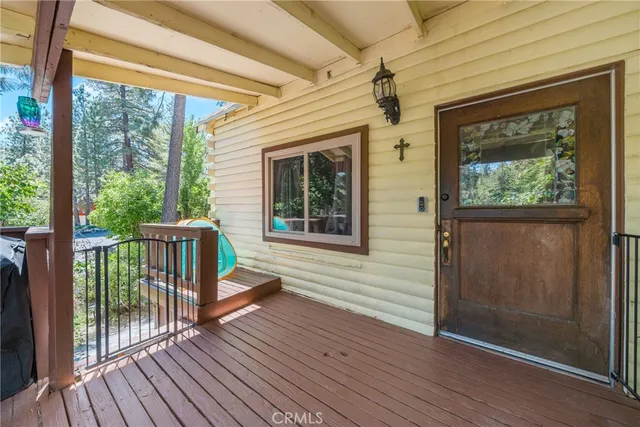 a porch with wooden floor