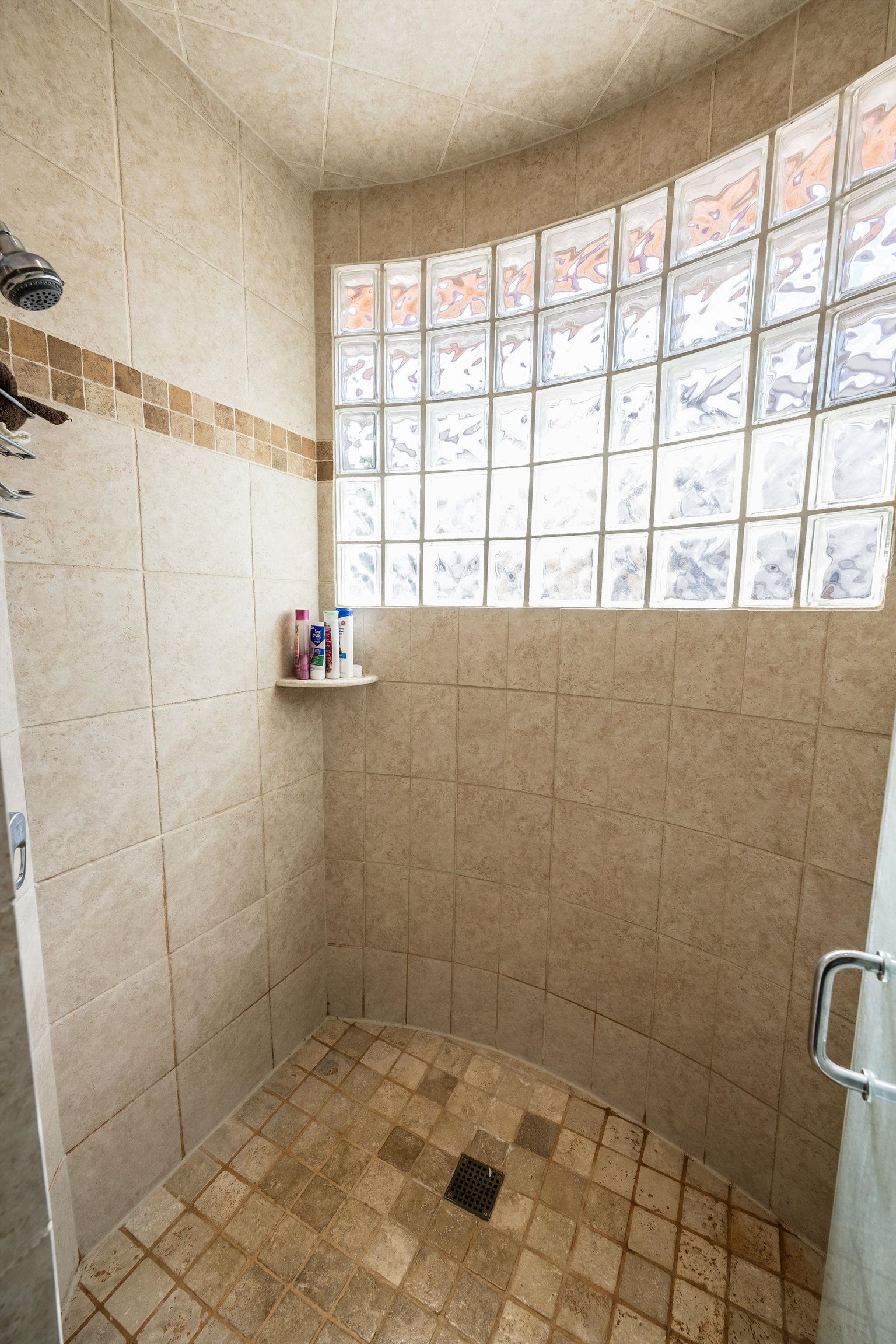 2069 Spur Cross Road Grand Junction, CO 81507 - Photo 14 of 40 a bathroom with a shower