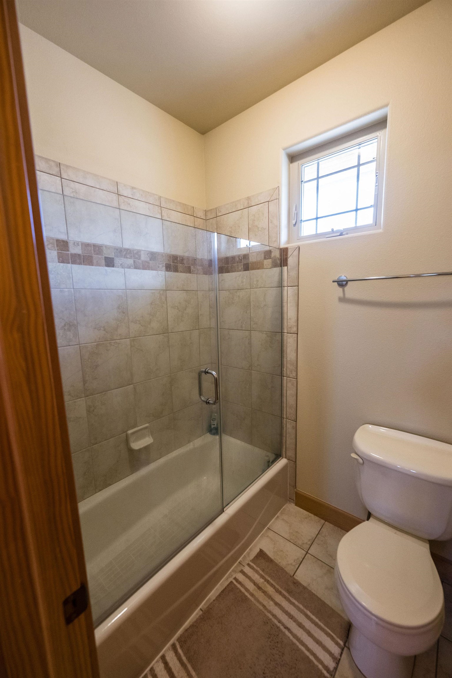 2069 Spur Cross Road Grand Junction, CO 81507 - Photo 23 of 40 a bathroom with a toilet and a shower