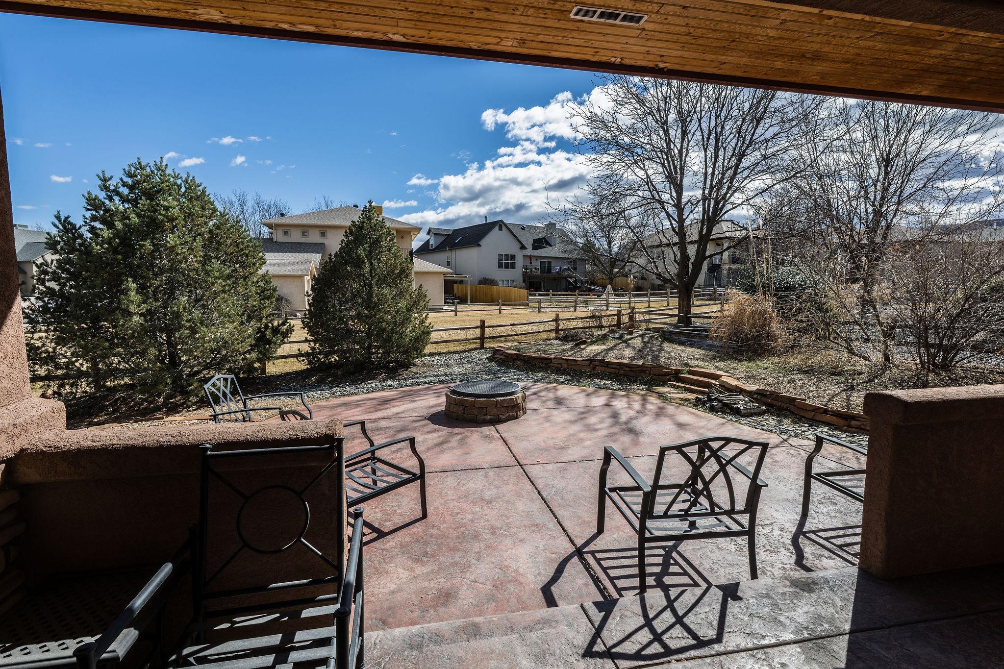 2069 Spur Cross Road Grand Junction, CO 81507 - Photo 32 of 40 a view of a backyard with sitting area