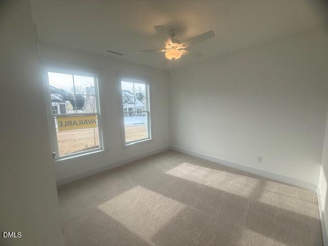 35 Slippery Elm Road Youngsville, NC 27596 - Photo 3 of 37 a view of an empty room with a window