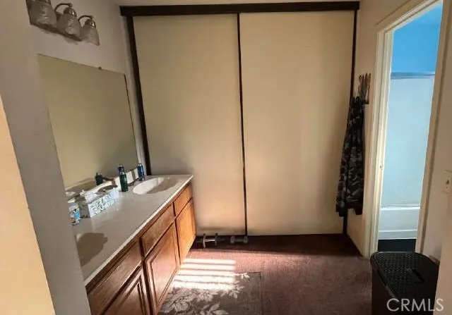 a view of a street with a building in the background