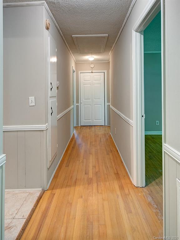 858 State Rd S-29-376 Lancaster, SC 29720 - Photo 15 of 28 a view of hallway with wooden floor