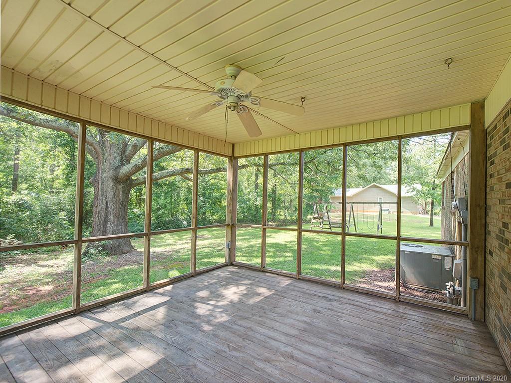 858 State Rd S-29-376 Lancaster, SC 29720 - Photo 23 of 28 a view of empty room with wooden floor and fan