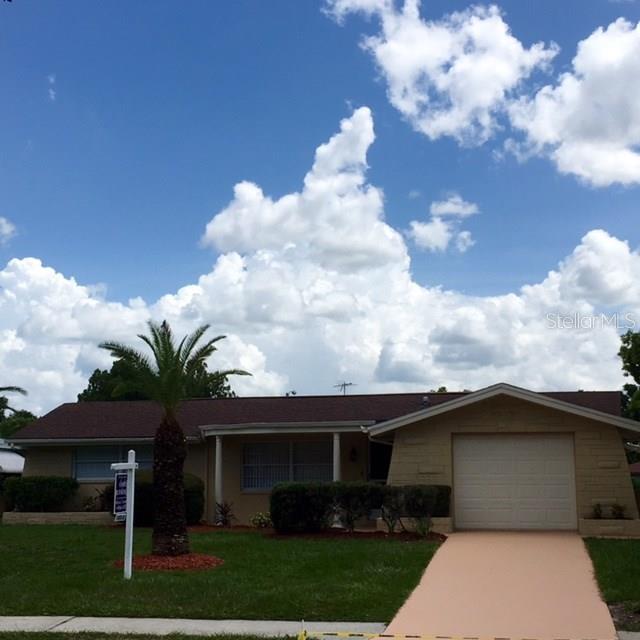 7040 Embassy Boulevard Port Richey, FL 34668 - Photo 1 of 1 EXTERIOR FRONT