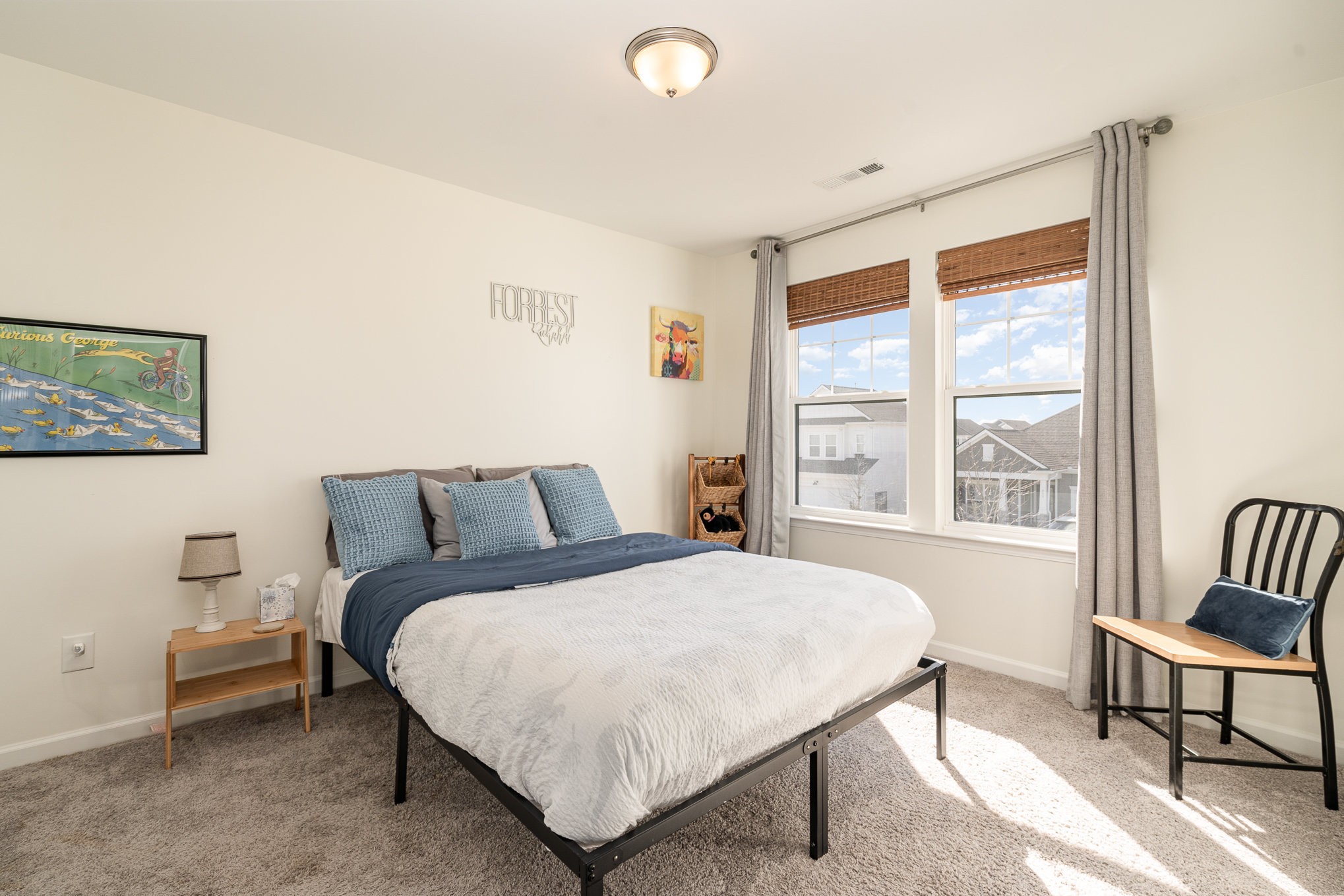 956 Carraway Lane Spring Hill, TN 37174 - Photo 18 of 27 a bedroom with a bed and a window