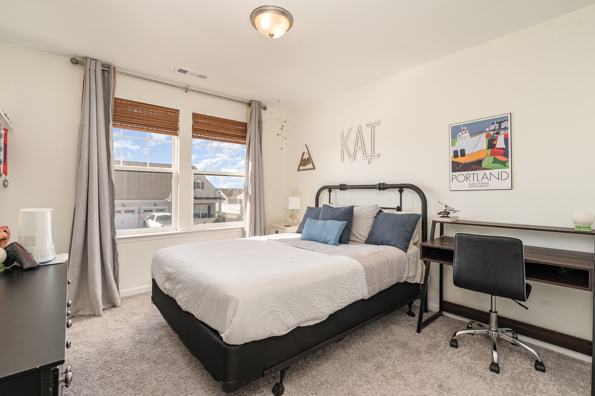 956 Carraway Lane Spring Hill, TN 37174 - Photo 20 of 27 a bedroom with a bed and a desk