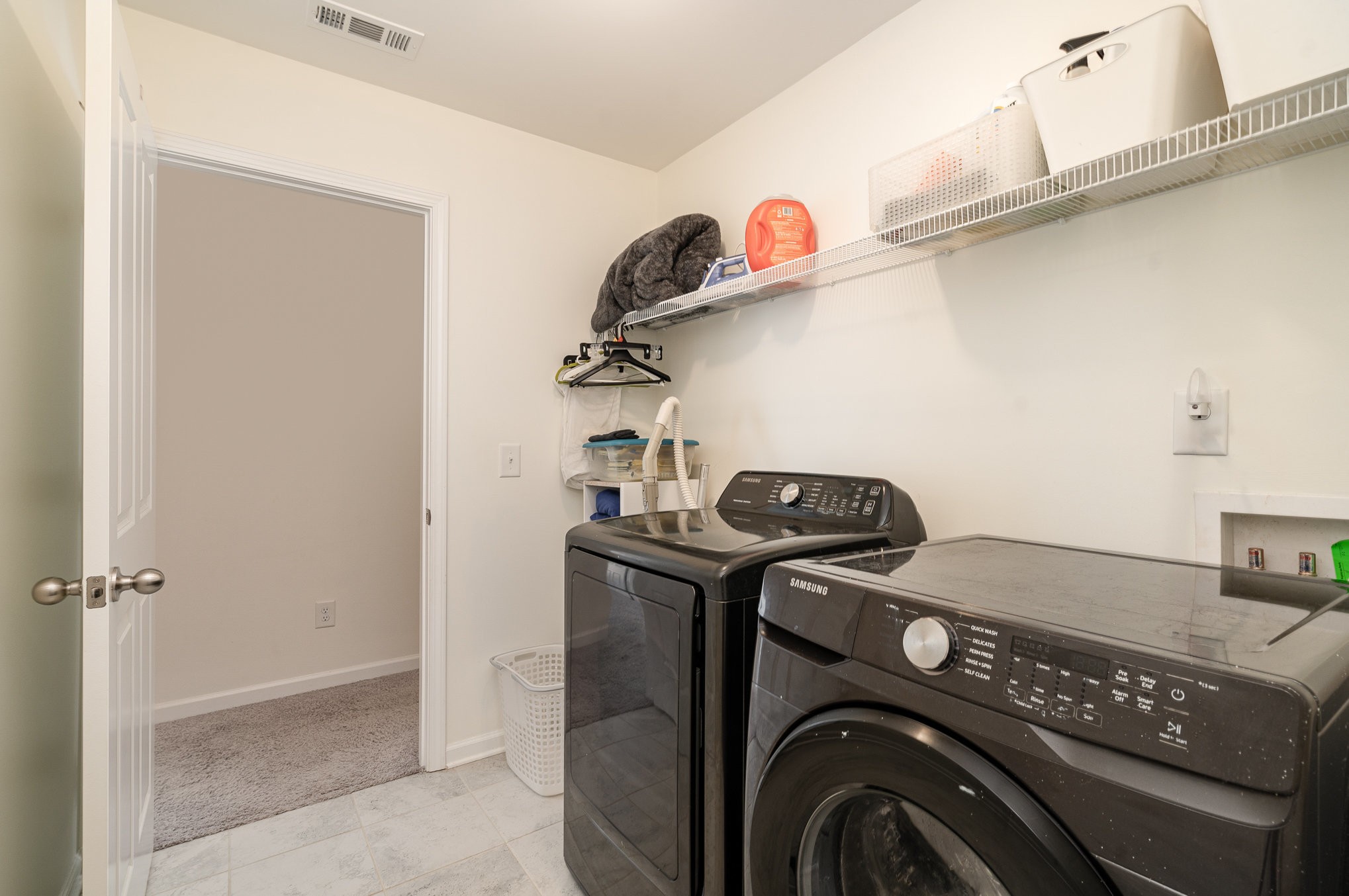 956 Carraway Lane Spring Hill, TN 37174 - Photo 21 of 27 a utility room with dryer and washer