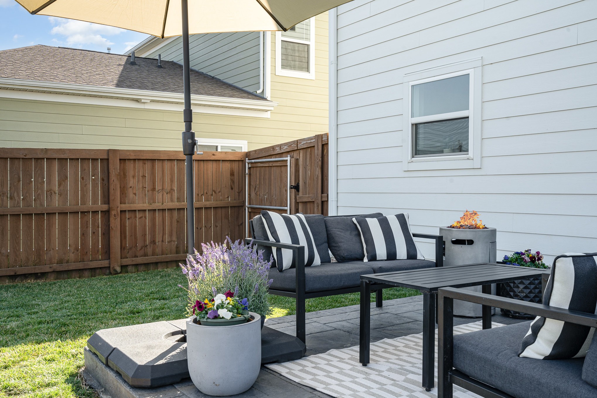 956 Carraway Lane Spring Hill, TN 37174 - Photo 25 of 27 a view from a patio with a table and chairs