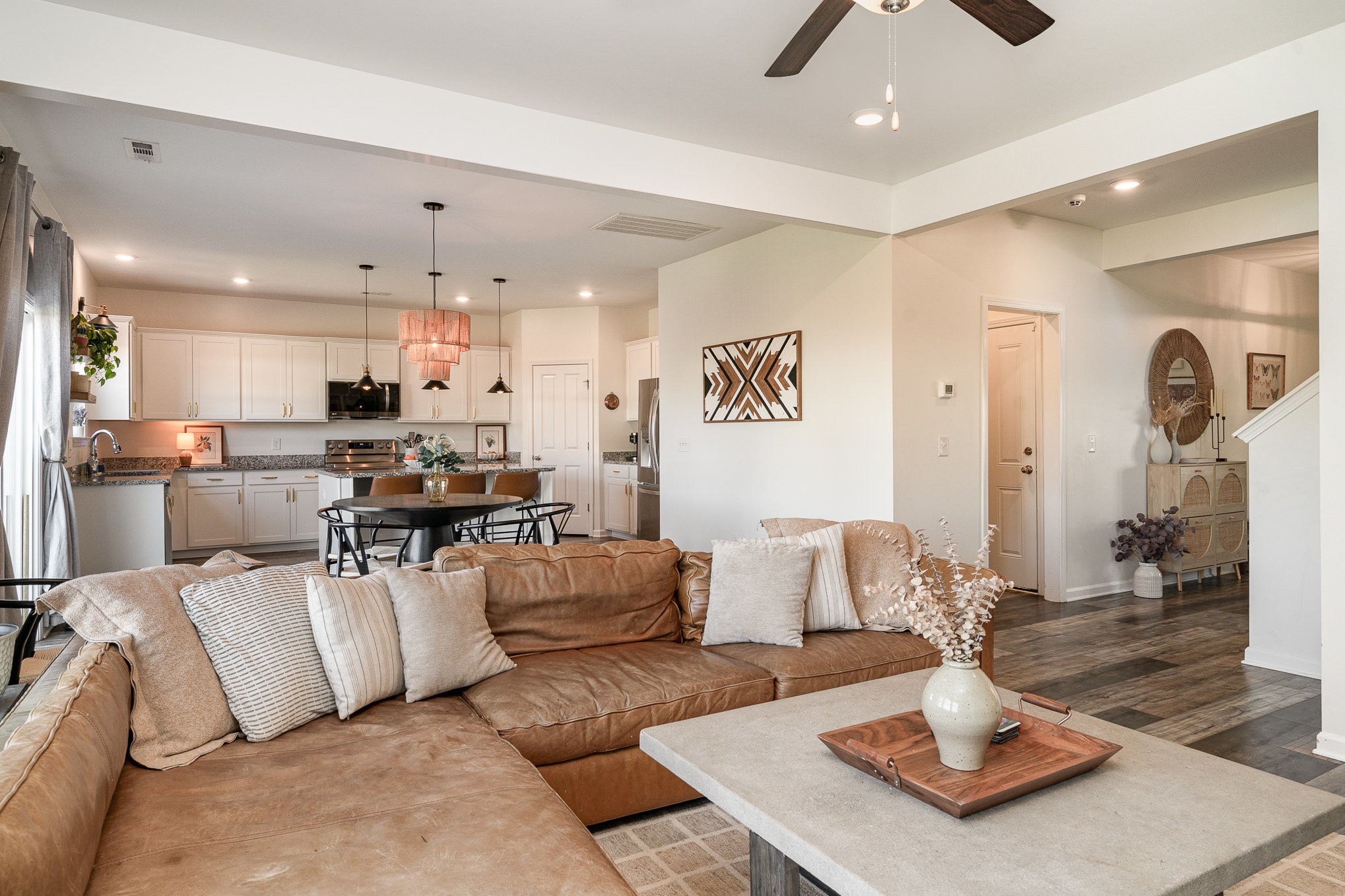 956 Carraway Lane Spring Hill, TN 37174 - Photo 5 of 27 a living room with furniture and kitchen view