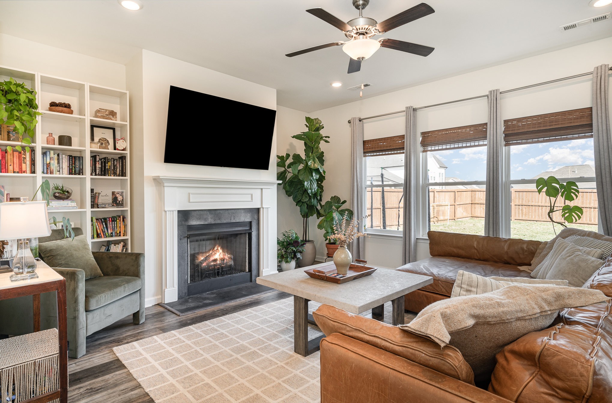 956 Carraway Lane Spring Hill, TN 37174 - Photo 6 of 27 a living room with furniture fireplace and flat screen tv
