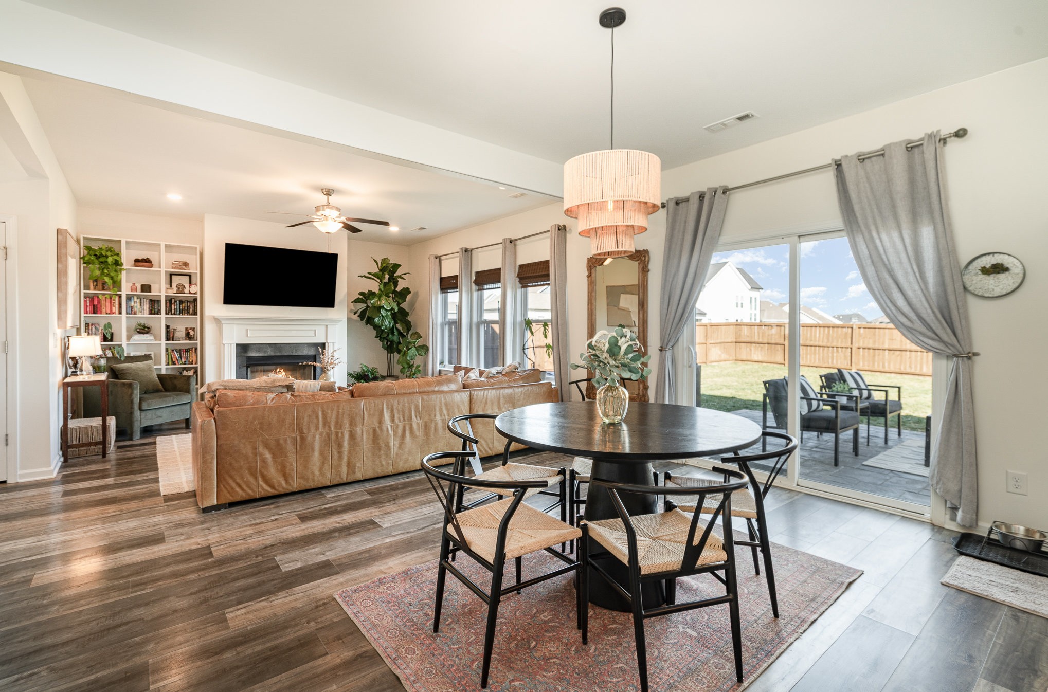 956 Carraway Lane Spring Hill, TN 37174 - Photo 9 of 27 a view of a dining room with furniture window and wooden floor