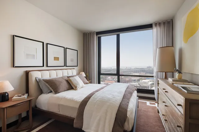 a kitchen with a table chairs stove and refrigerator