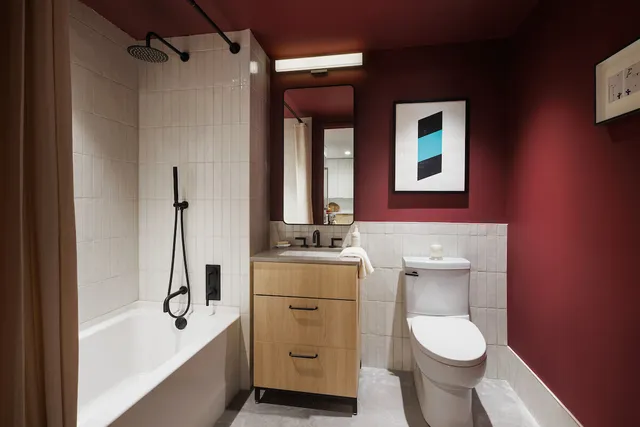 a living room with fireplace furniture and a flat screen tv