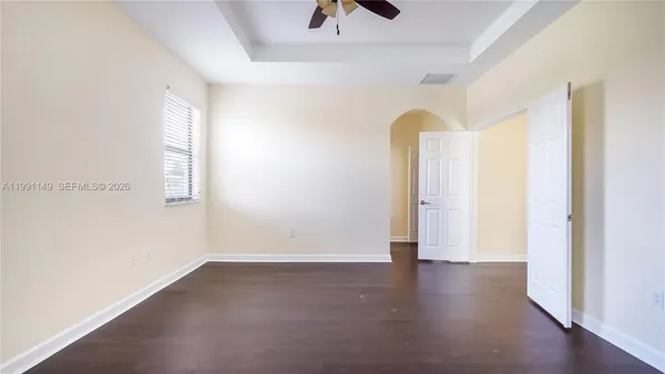 a bathroom with a shower and a sink