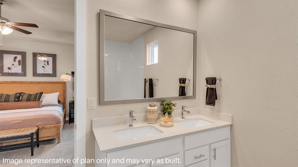 1620 Buckskin Road Oak Point, TX 75068 - Photo 16 of 26 a en suite bathroom with a sink and a mirror
