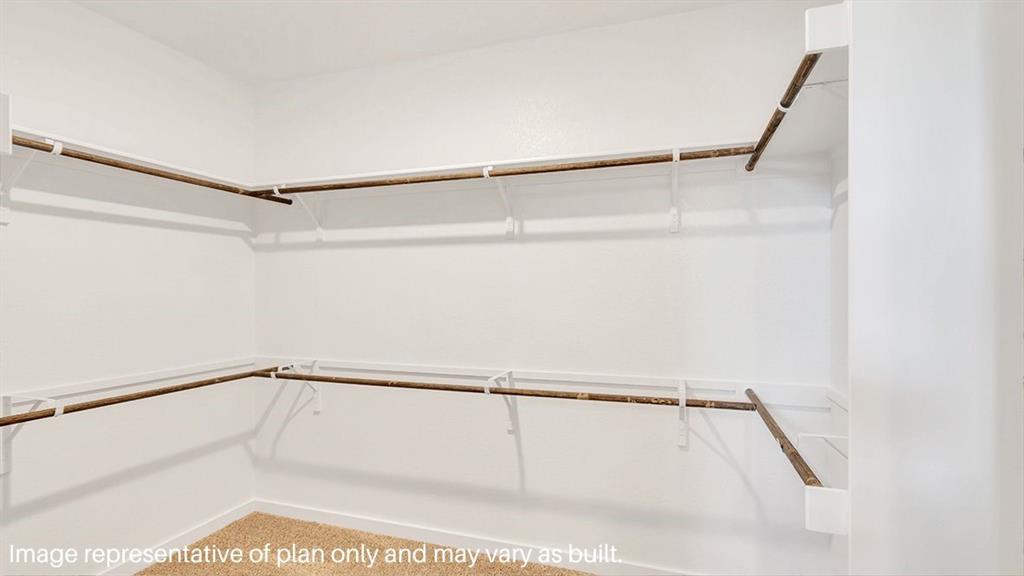 1620 Buckskin Road Oak Point, TX 75068 - Photo 18 of 26 a view of walk in closet