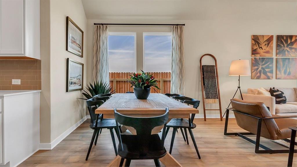 1620 Buckskin Road Oak Point, TX 75068 - Photo 8 of 26 a view of a dining room with furniture and window