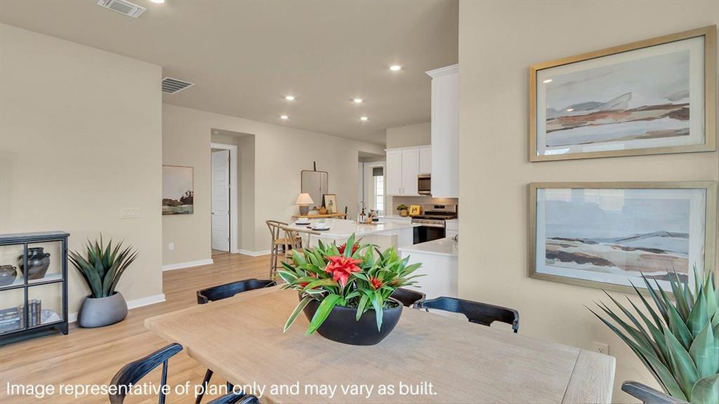 1620 Buckskin Road Oak Point, TX 75068 - Photo 9 of 26 a view of kitchen with furniture and a potted plant