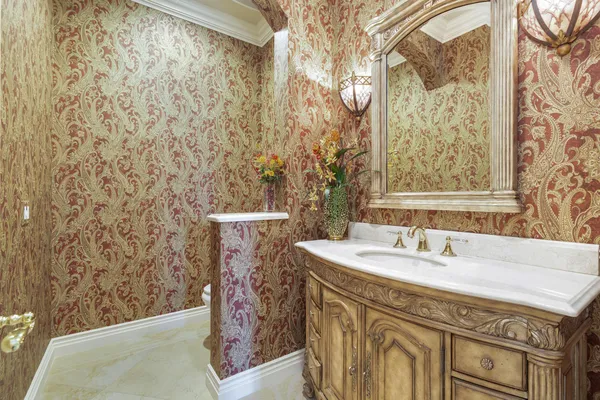 a bathroom with a sink a mirror and a shower