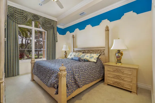 a large kitchen with a table and chairs