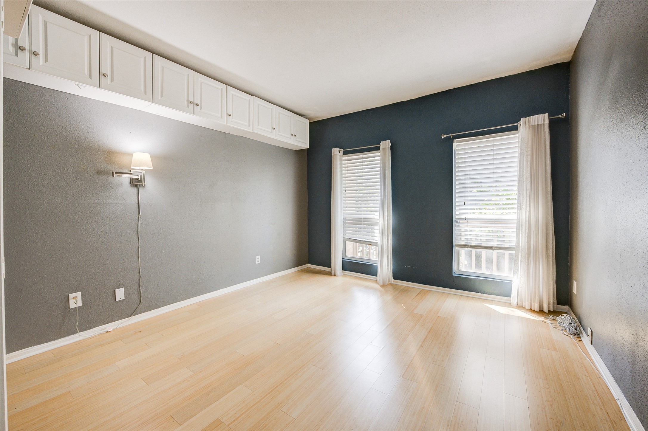 2100 Tanglewilde Street, Unit 51 Houston, TX 77063 - Photo 19 of 24 a view of an empty room with a window