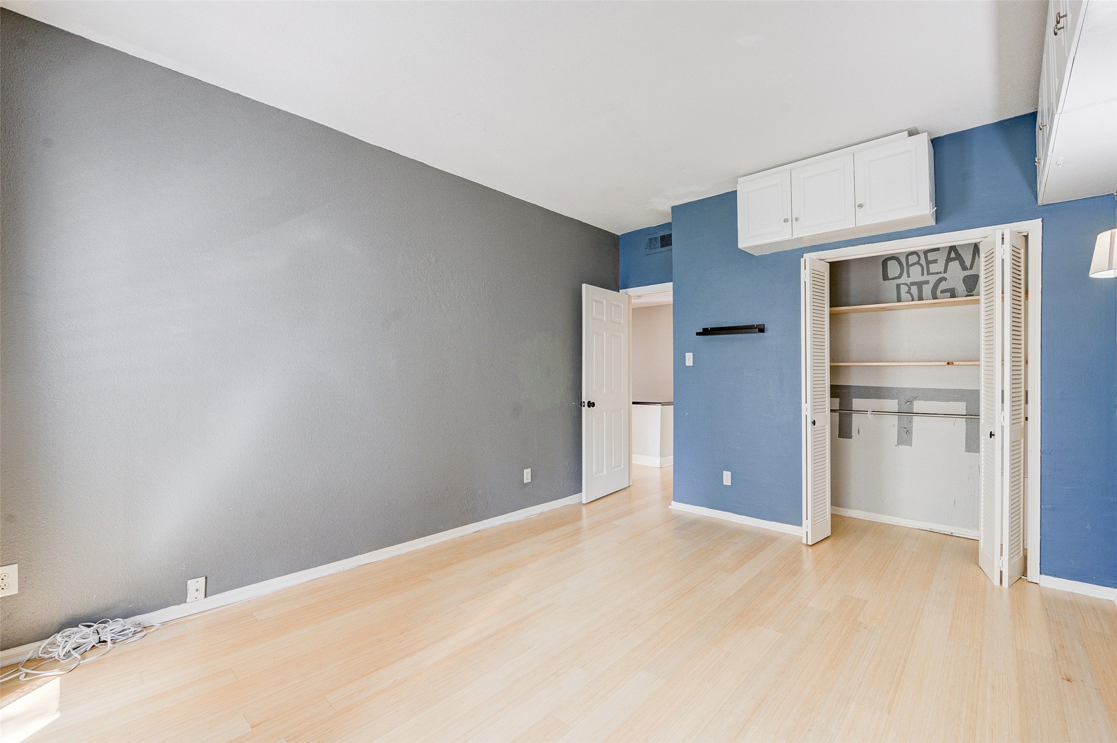 2100 Tanglewilde Street, Unit 51 Houston, TX 77063 - Photo 20 of 24 a view of a kitchen with refrigerator and cabinet